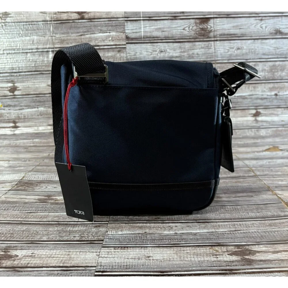 Tumi Fremont KERBY 9.5” Sling Crossbody Bag color NAVY BLUE NWT mspr $295